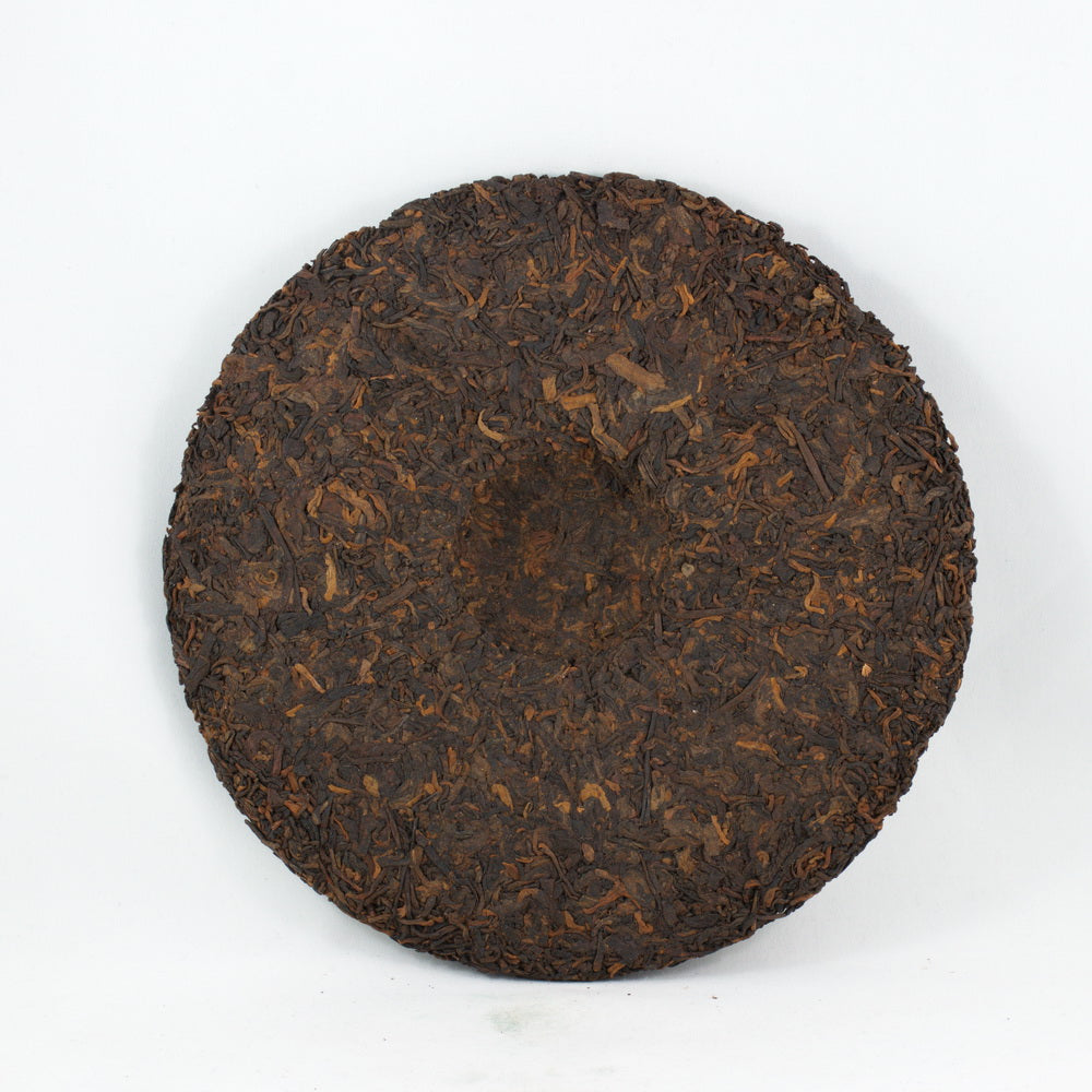 Pu-Erh Tea Cake Red Dayi 7262 Menghai Tea Factory, 2003 (Ripe/Shou)
