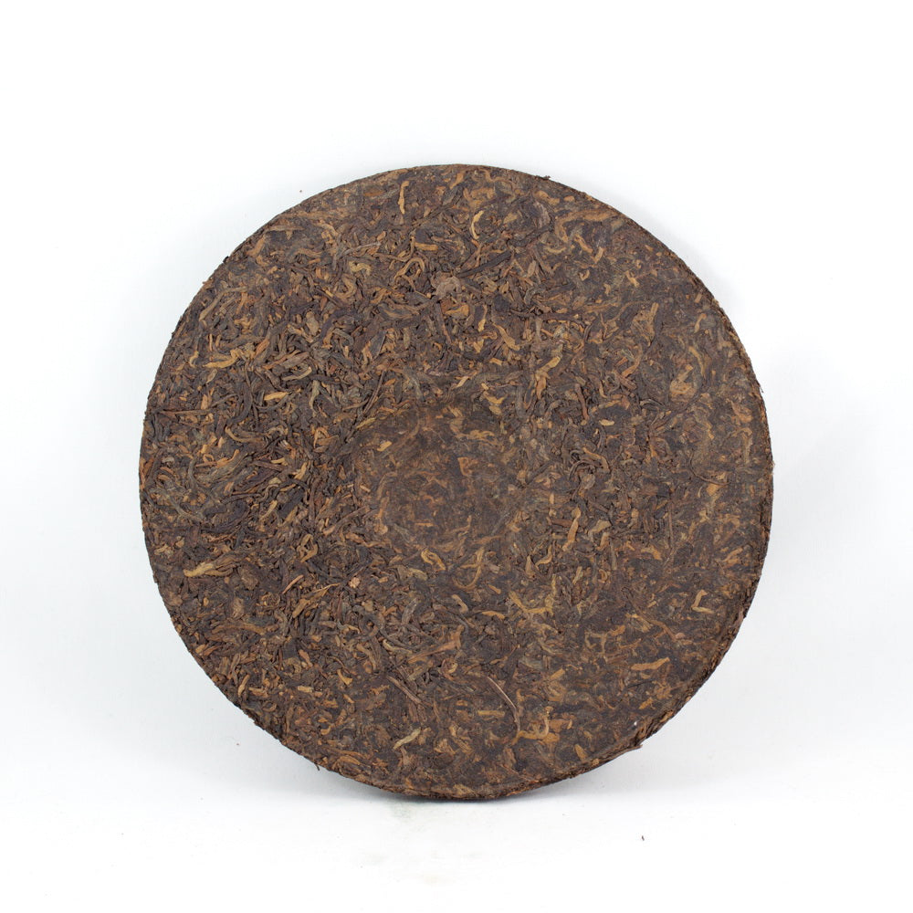 Pu-Erh Iron Mold Tea Cake, Golden Tips (Jin Ya), Chuan Long Tea Factory, 2003 (Ripe/Shou)