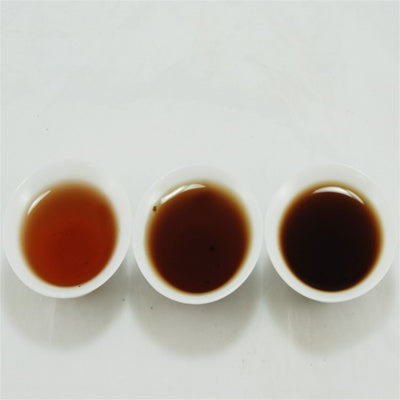 Pu-Erh Tea Cake Red Dayi 7262 Menghai Tea Factory, 2003 (Ripe/Shou)
