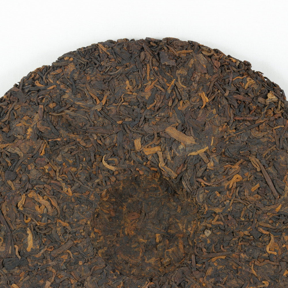 Pu-Erh Tea Cake Red Dayi 7262  Menghai Tea Factory, 2003 (Ripe/Shou)