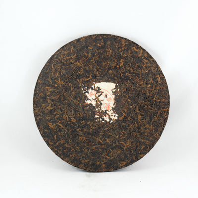 Pu-Erh Iron Mold Tea Cake, Golden Tips (Jin Ya), Chuan Long Tea Factory, 2003 (Ripe/Shou)