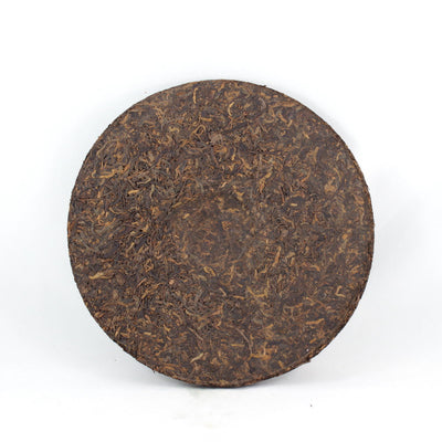 Pu-Erh Iron Mold Tea Cake, Golden Tips (Jin Ya), Chuan Long Tea Factory, 2003 (Ripe/Shou)