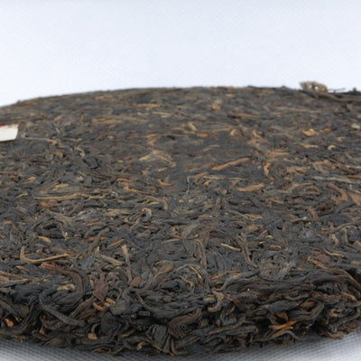 1990's Jiang Cheng Spring Tips Pu-erh Tea Cake (Raw/Sheng)