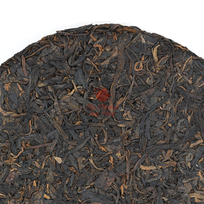 1990's Red Mark Iron Mold Pu-erh Tea Cake (Raw/Sheng)